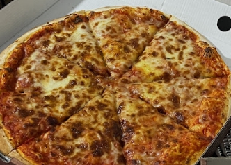 A margherita pizza with melted cheese